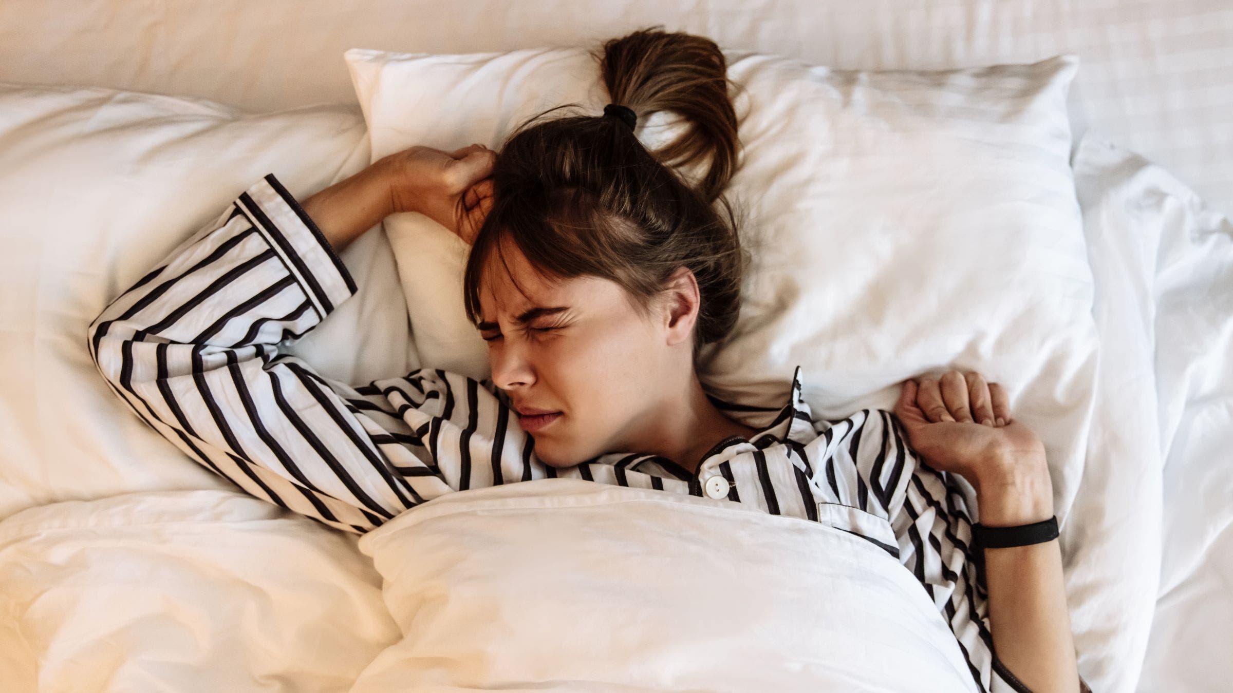 A woman awakes from a weird tri dream.