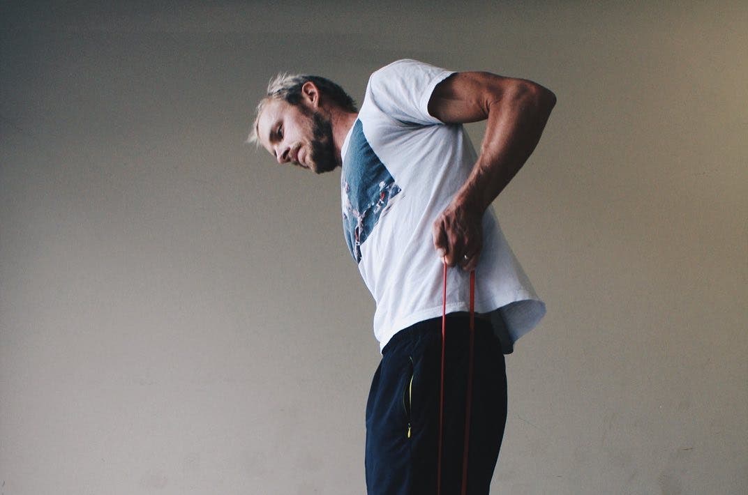 Ben Kanute does mobility drills for triathletes