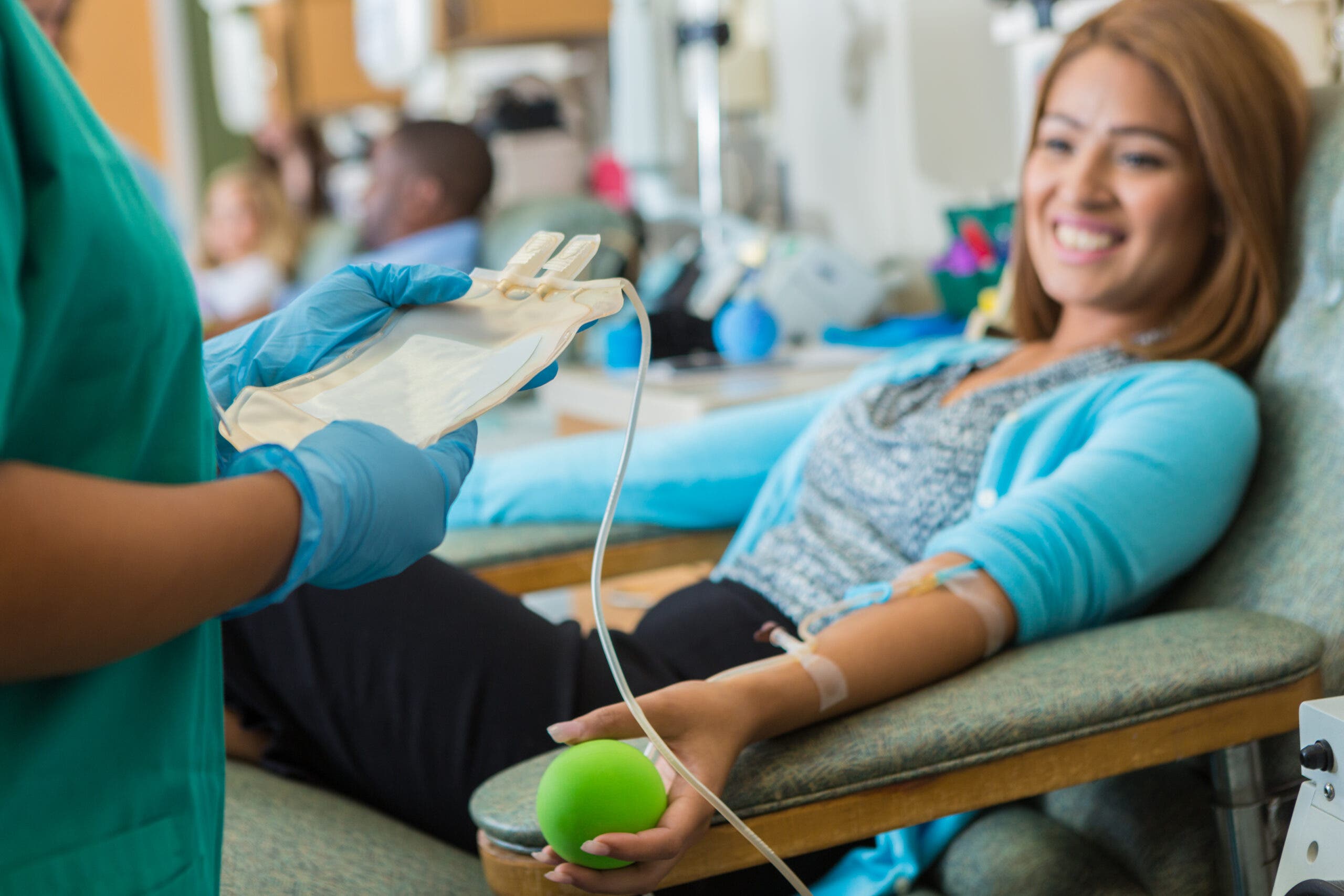 A woman donates blood. Many donors wonder when it is safe to exercise after giving blood.