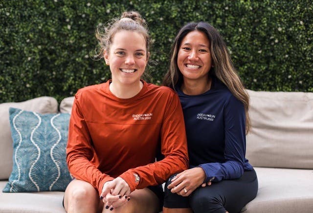 Jessica Schiner Coaches of Color poses with a runner