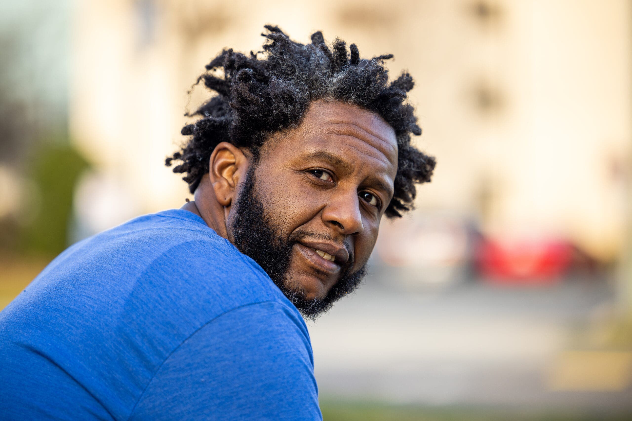 John Gerst, a triathlete who lost weight through triathlon, looks over his shoulder