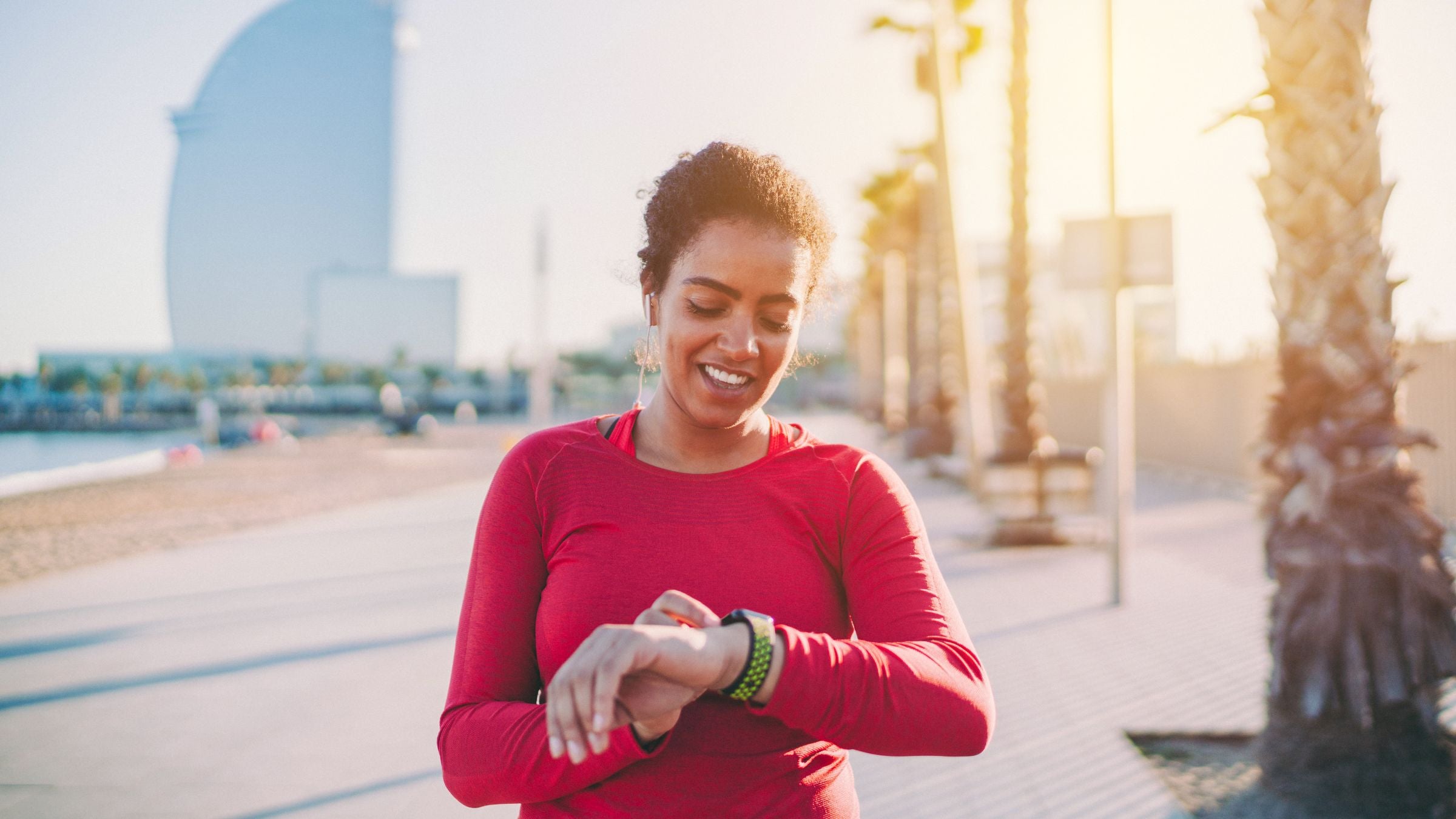 Athlete looks at watch