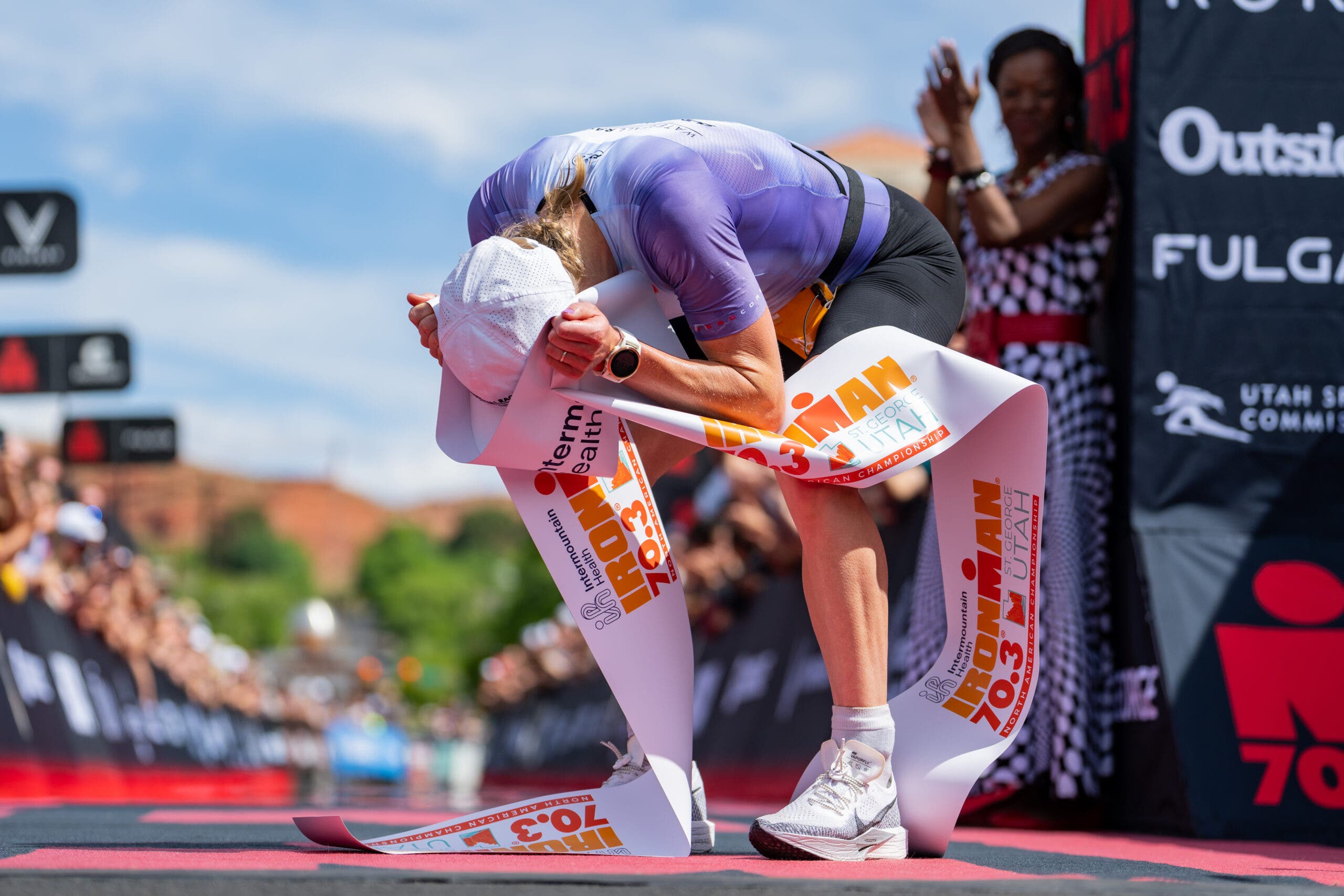 An emotional Jeanni Metzler takes the win at Ironman 70.3 St. George.
