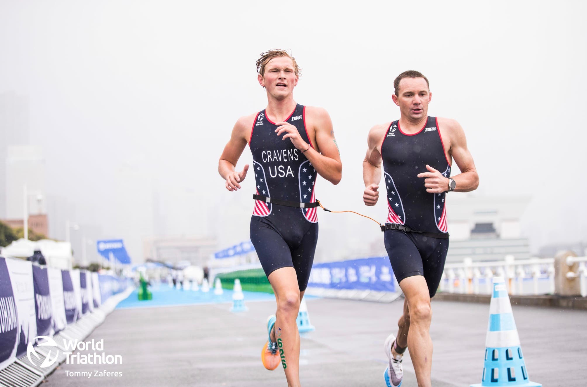 Owen Craven (R) and guide Ben Hoffman race at World Triathlon Para Series Yokohama.