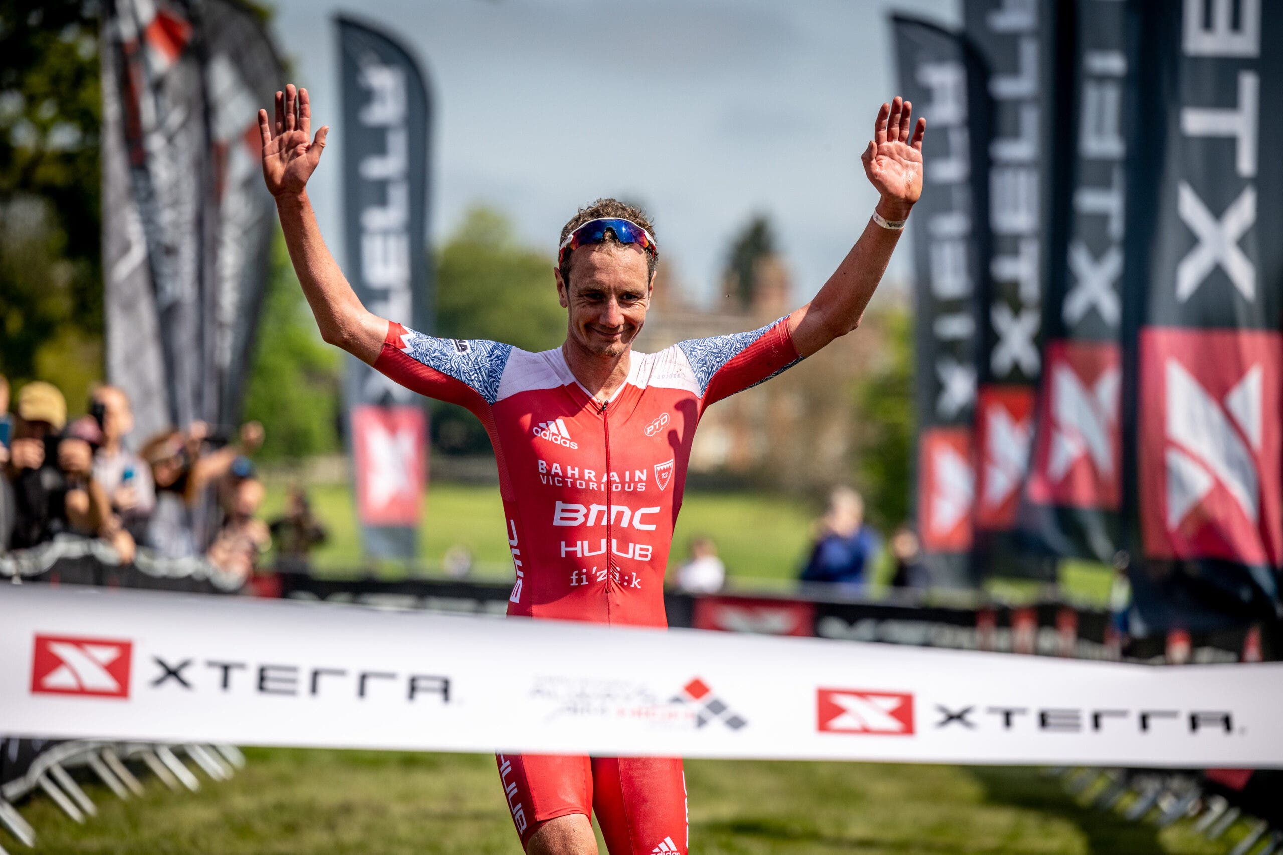 Ali Brownlee crosses the finish line as he wins XTERRA