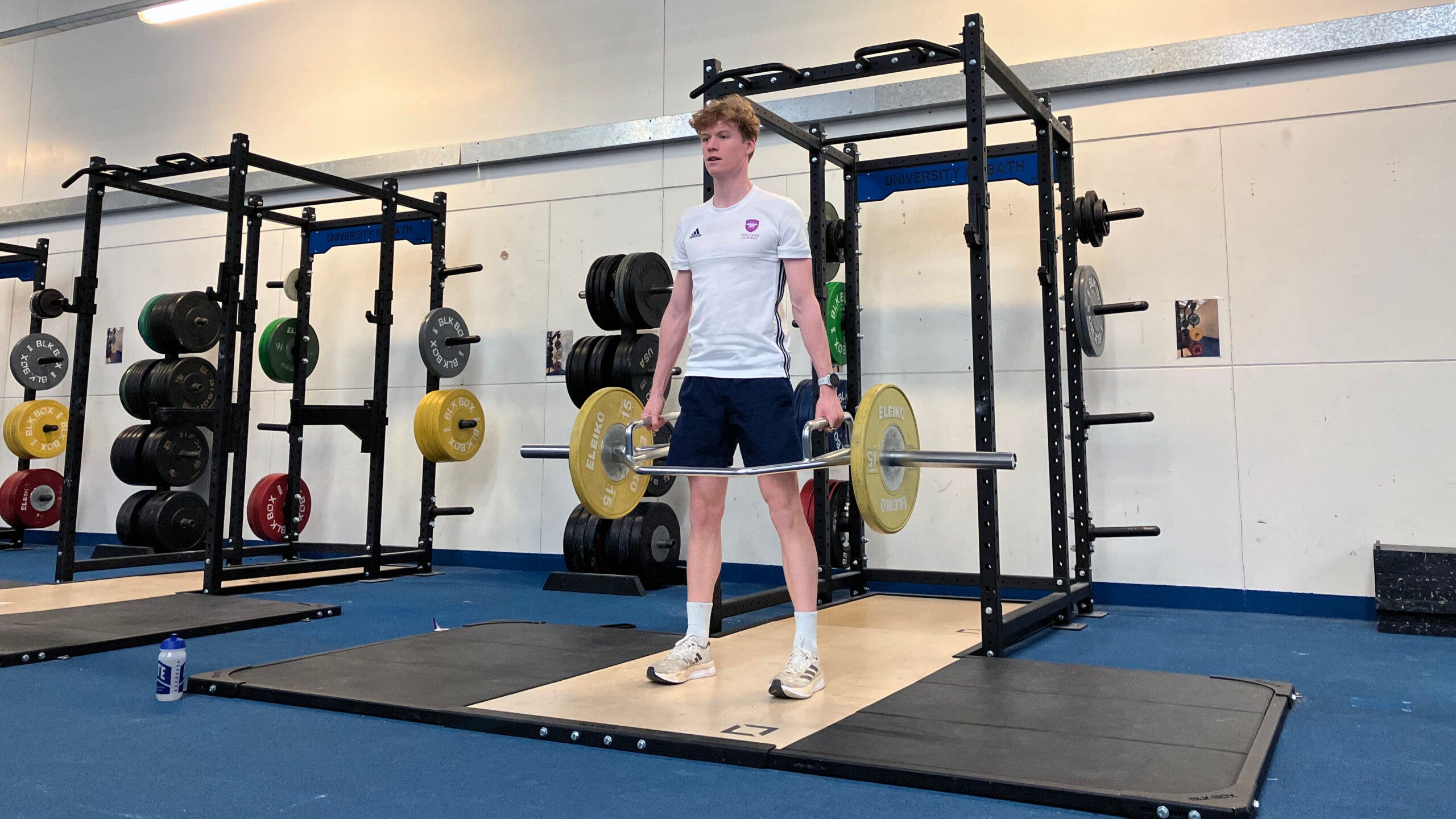 A british triathlete trains in the weight room at the University of Bath
