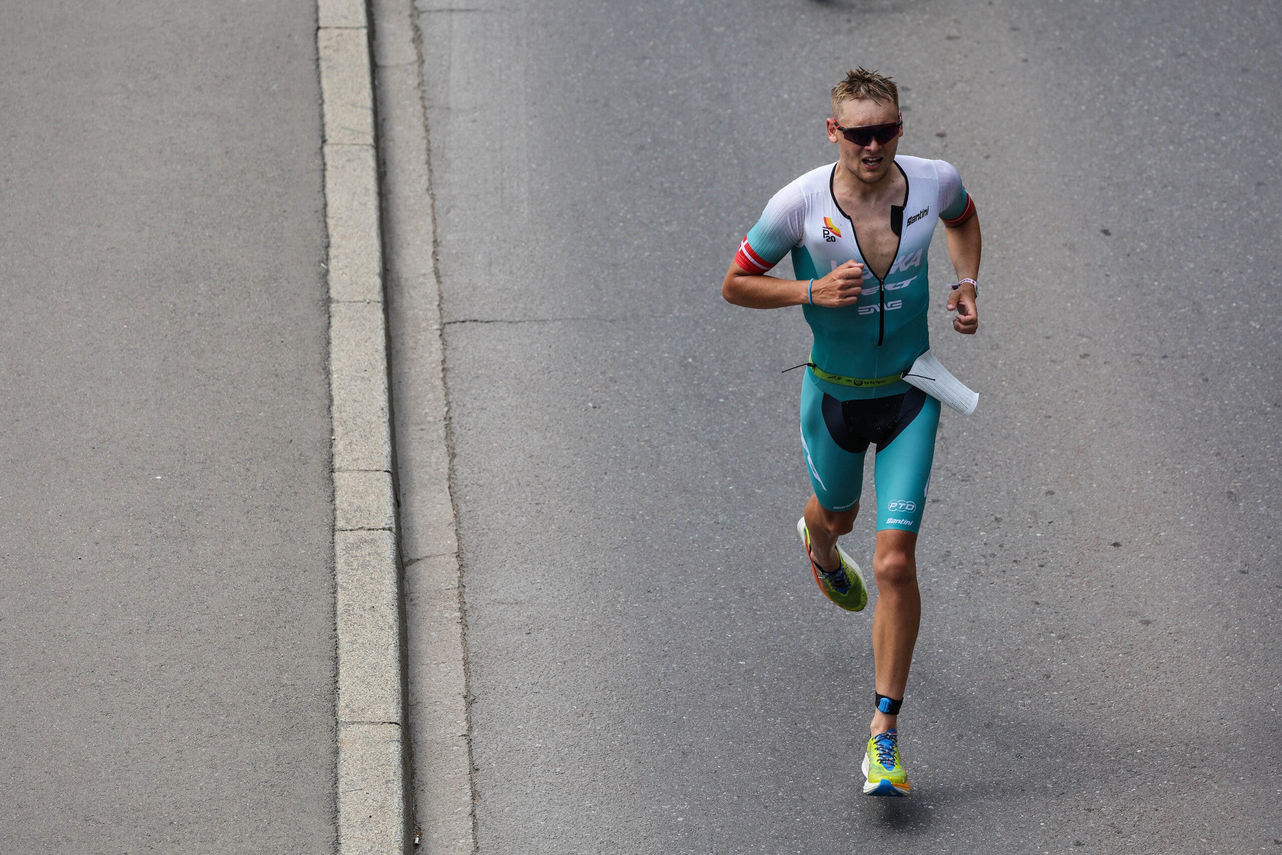 Miki Taagholt of Denmark competes in the run section of Ironman 70.3 Luxembourg.