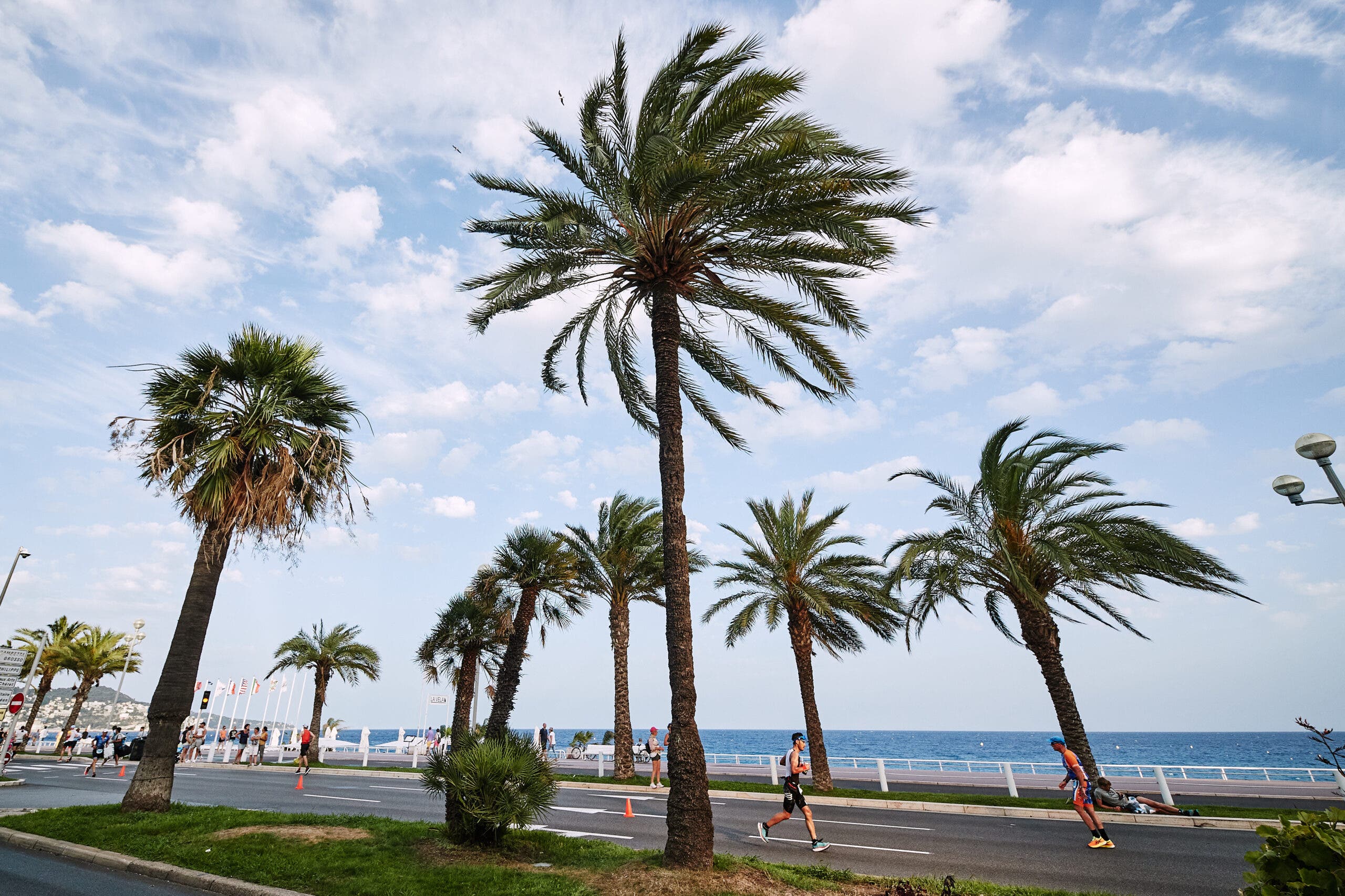Athletes compete in the run section during the Ironman France Nice 2022.