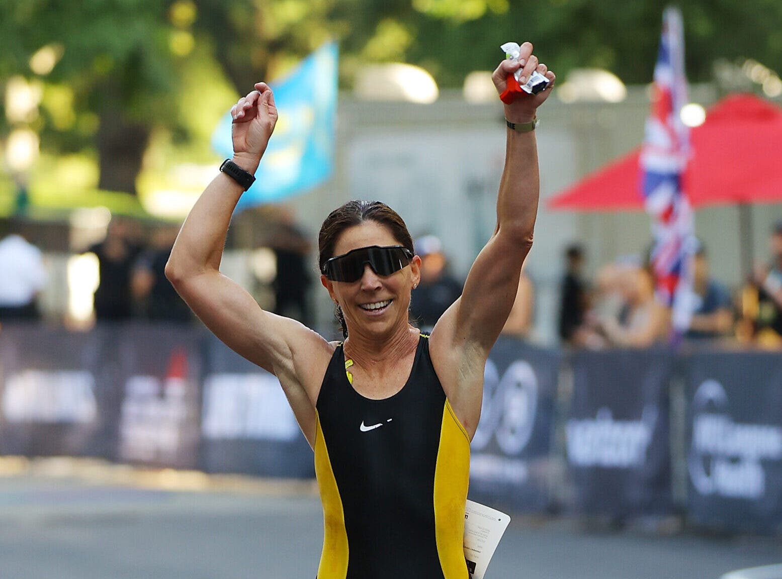 Rebeccah Wassner celebrates winning second place in the Women's New York City Triathlon on July 24, 2022 in New York City.