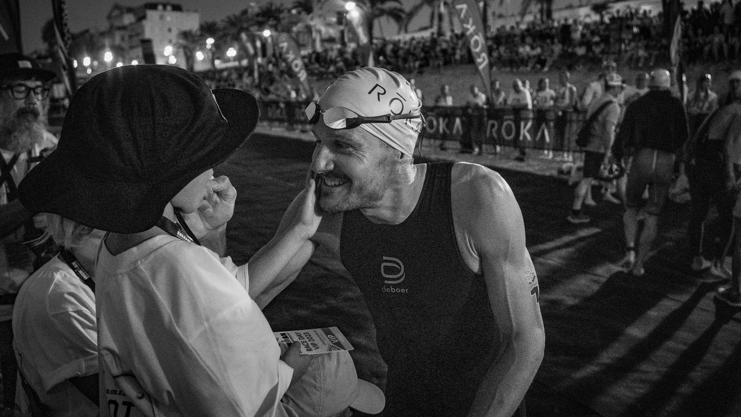 Jan Frodeno shares one last moment with his family members before the final race of his storied career - black and white edit