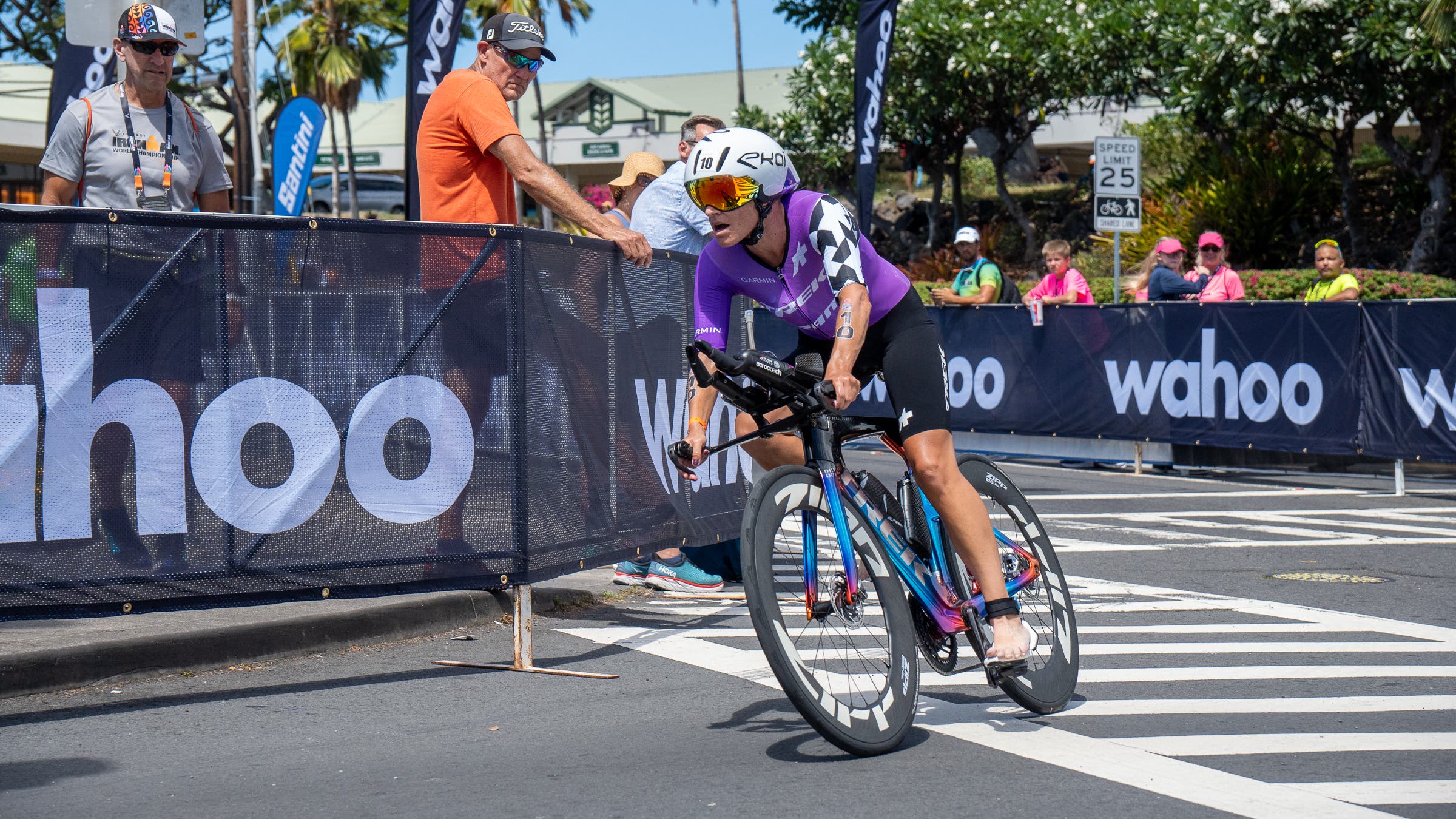 Skye Moench bikes into T2 at the 2023 Ironman World Championship.