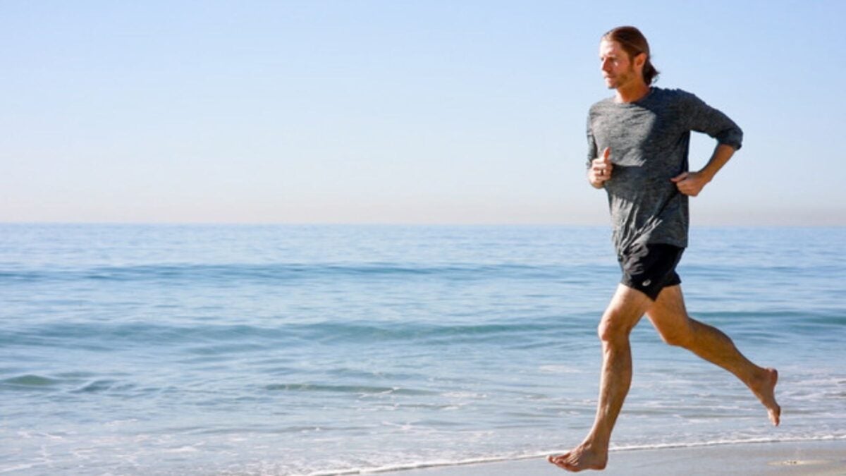 Meet the "Genius of Running" Behind Jan Frodeno and Taylor Knibb's