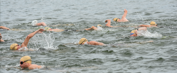 Athletes swim in Montgomery Bell State Park at the Dickson Endurance Triathlon, one of the best 2025 off-the-beaten-path races in the U.S.