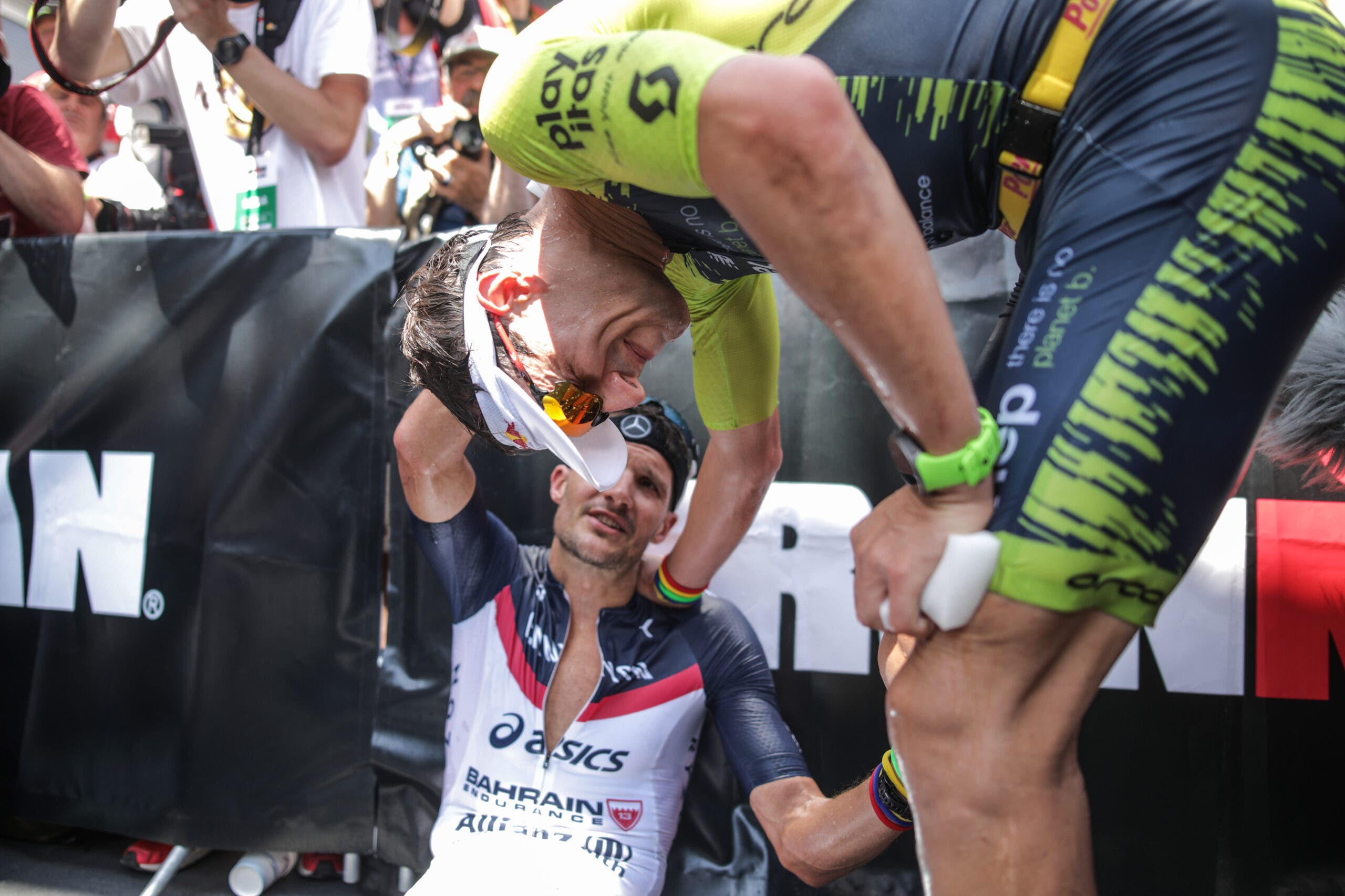Jan Frodeno and Sebastian Keinle shake hands after the 2019 Ironman European Championship in Frankfurt.