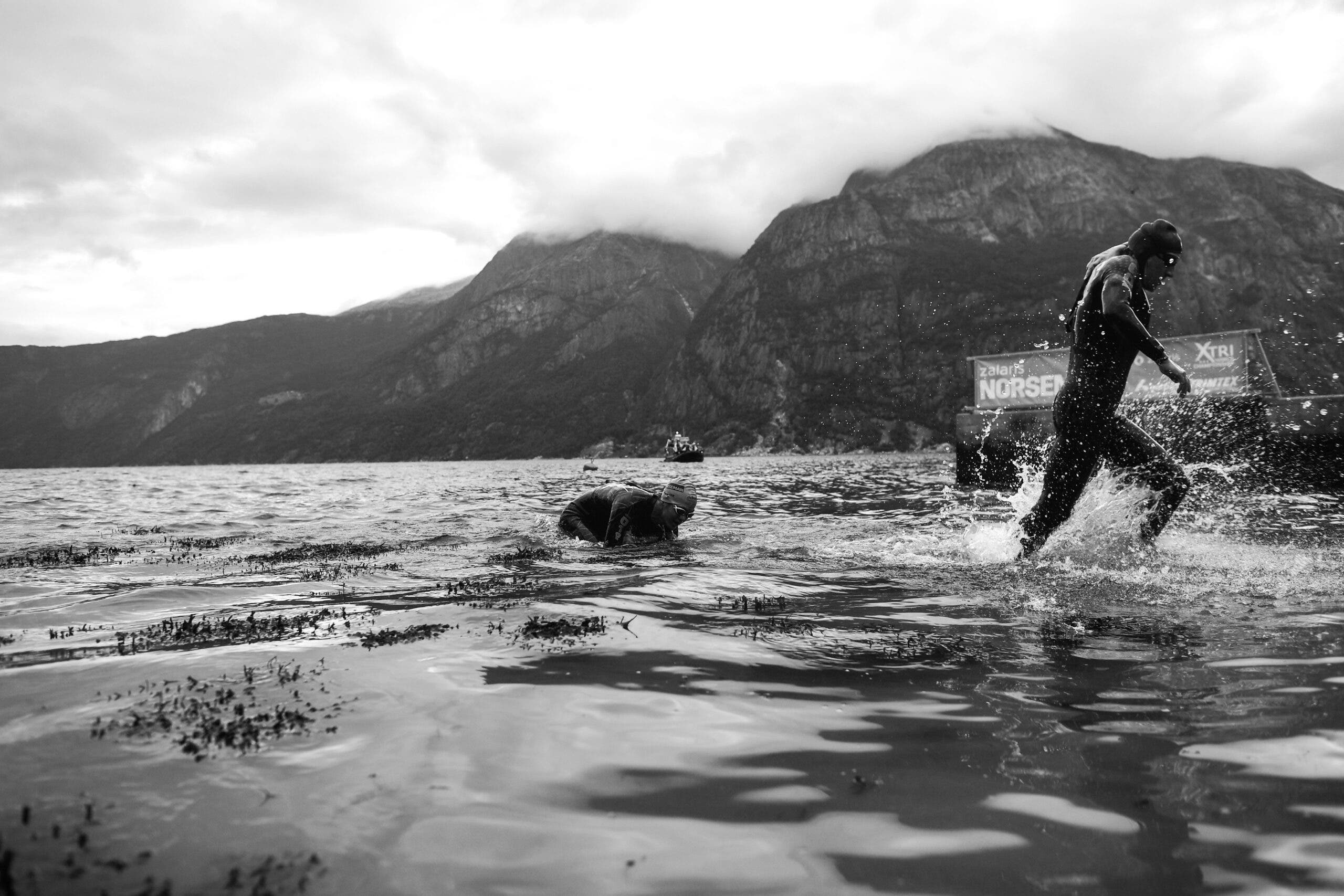 Sebastian Kienle exits the water at the Norseman Xtreme Triathlon during his "Discontinued" retirement tour.