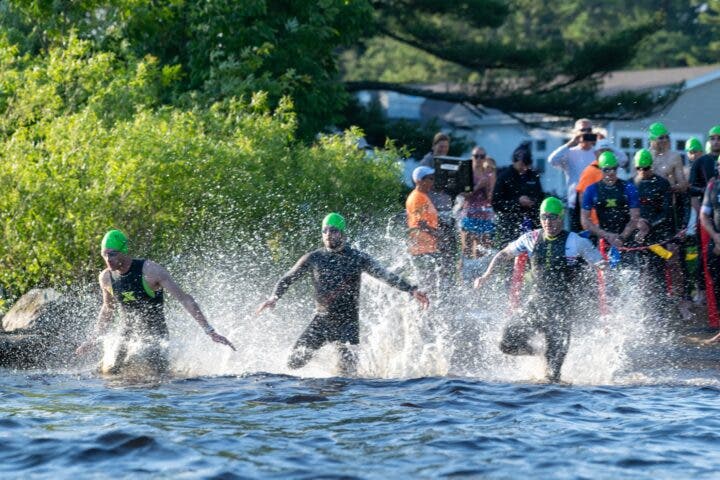 Athletes enter the water at the Patriot Half.