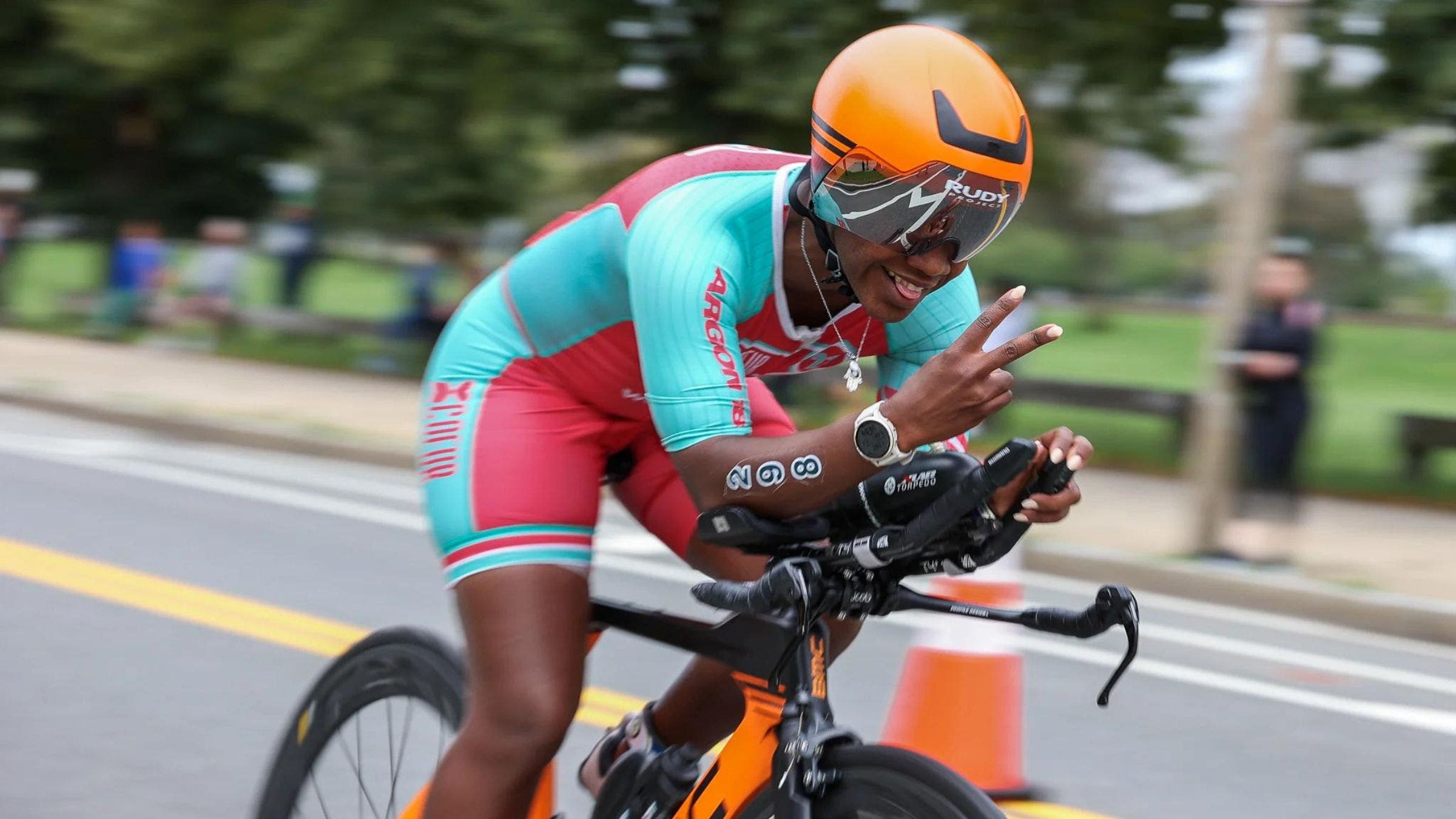 A triathlete does a practice race before her main triathlon of the year.