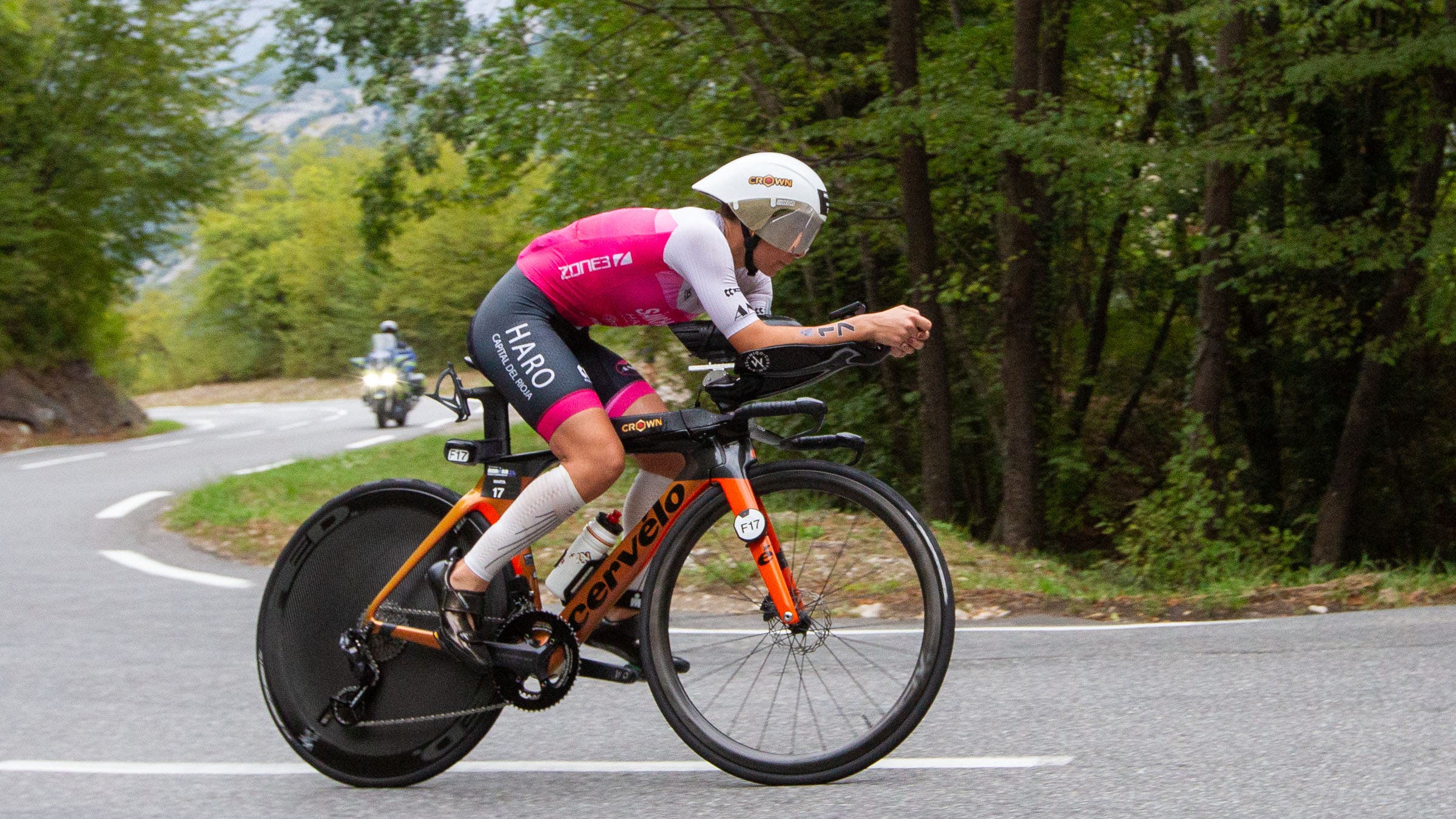 woman riding bike in aero position