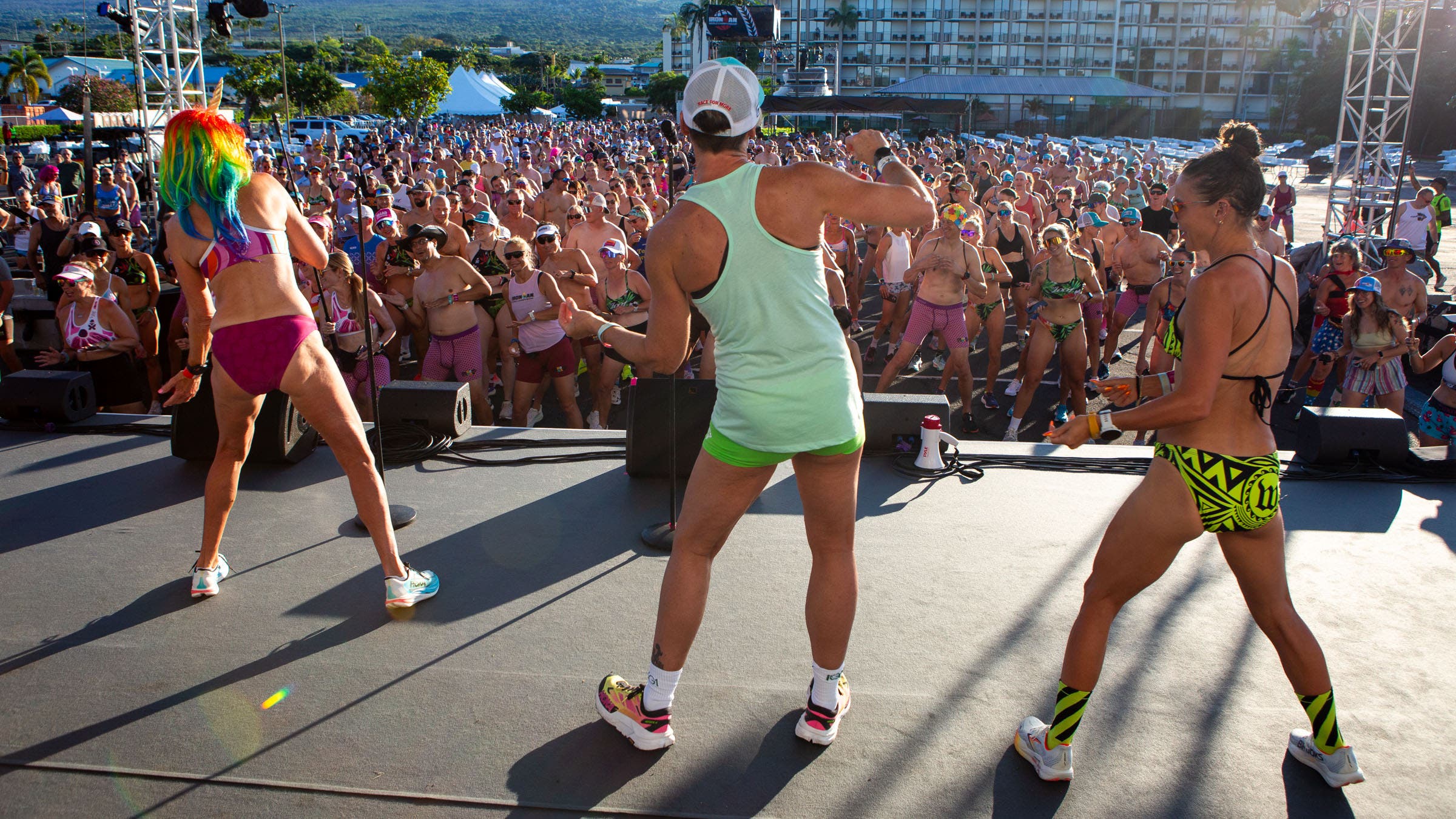 People dance on a stage during the Ironman World Championship Underpants Run.