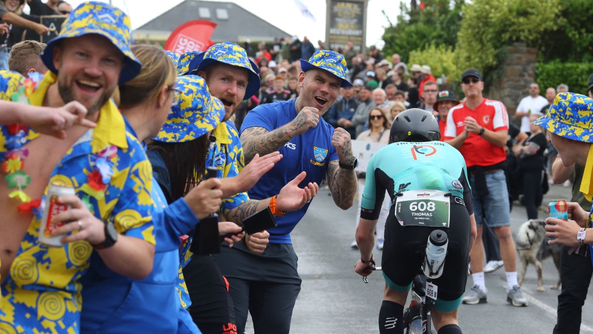 Photos: The Most Hilarious, Heartwarming, and Hardworking Triathlon Fans of 2024