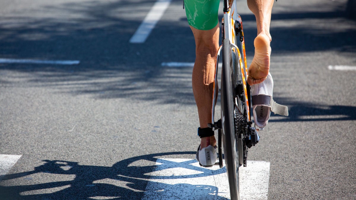 Why Bike Cramps Happen (And How To Prevent Them), According to a Physical Therapist