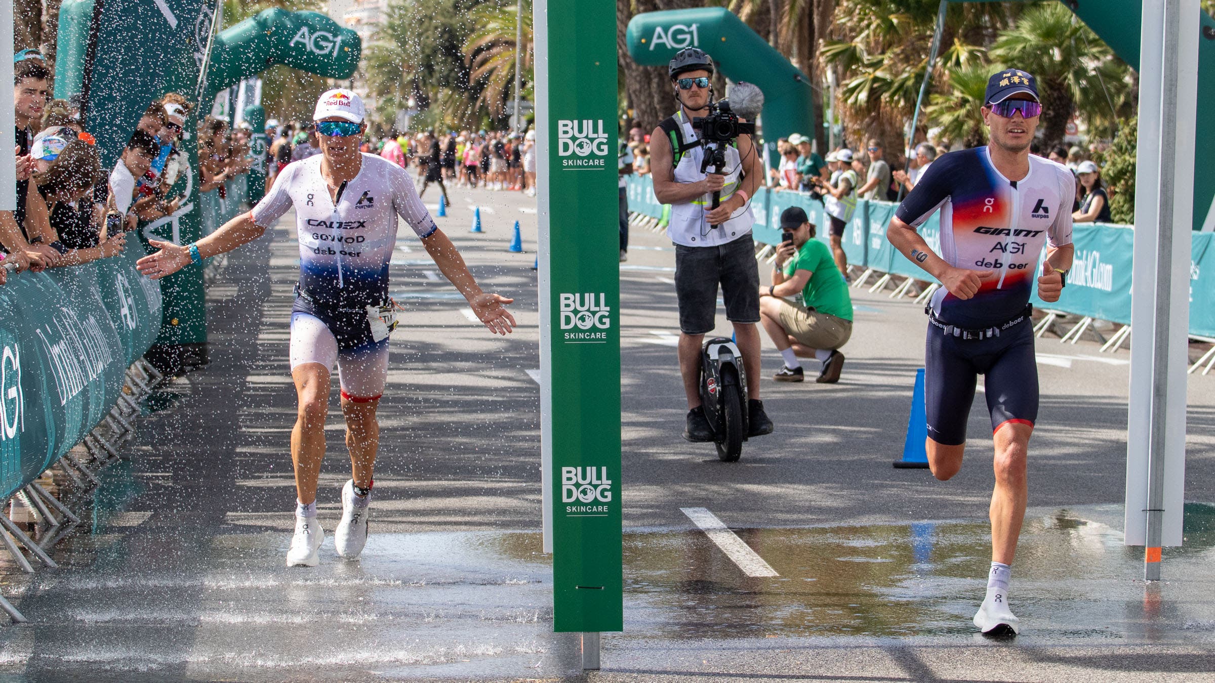 Despite struggling in the latter stages of the run, Blummenfelt (L) still hung on for third place, roughly two minutes behind Iden (R).