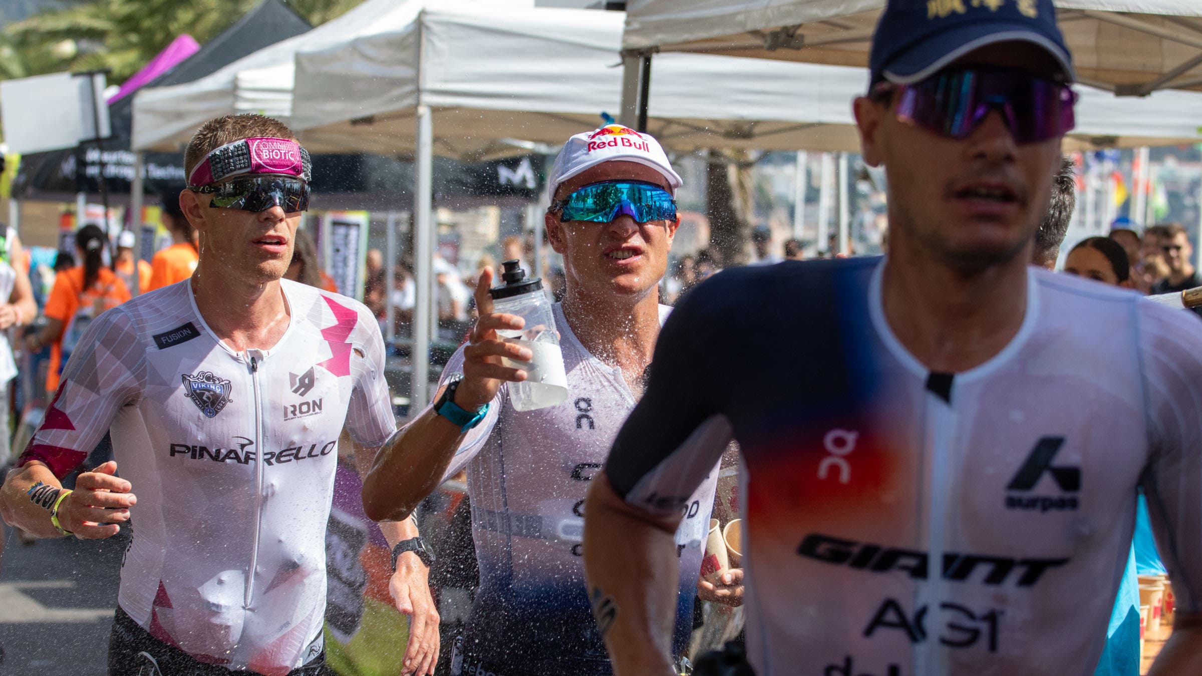 After a poor transition, Stornes (L) ran up to his countrymen, Blummenfelt and Iden (R), before taking the lead with less than 10 miles to go.