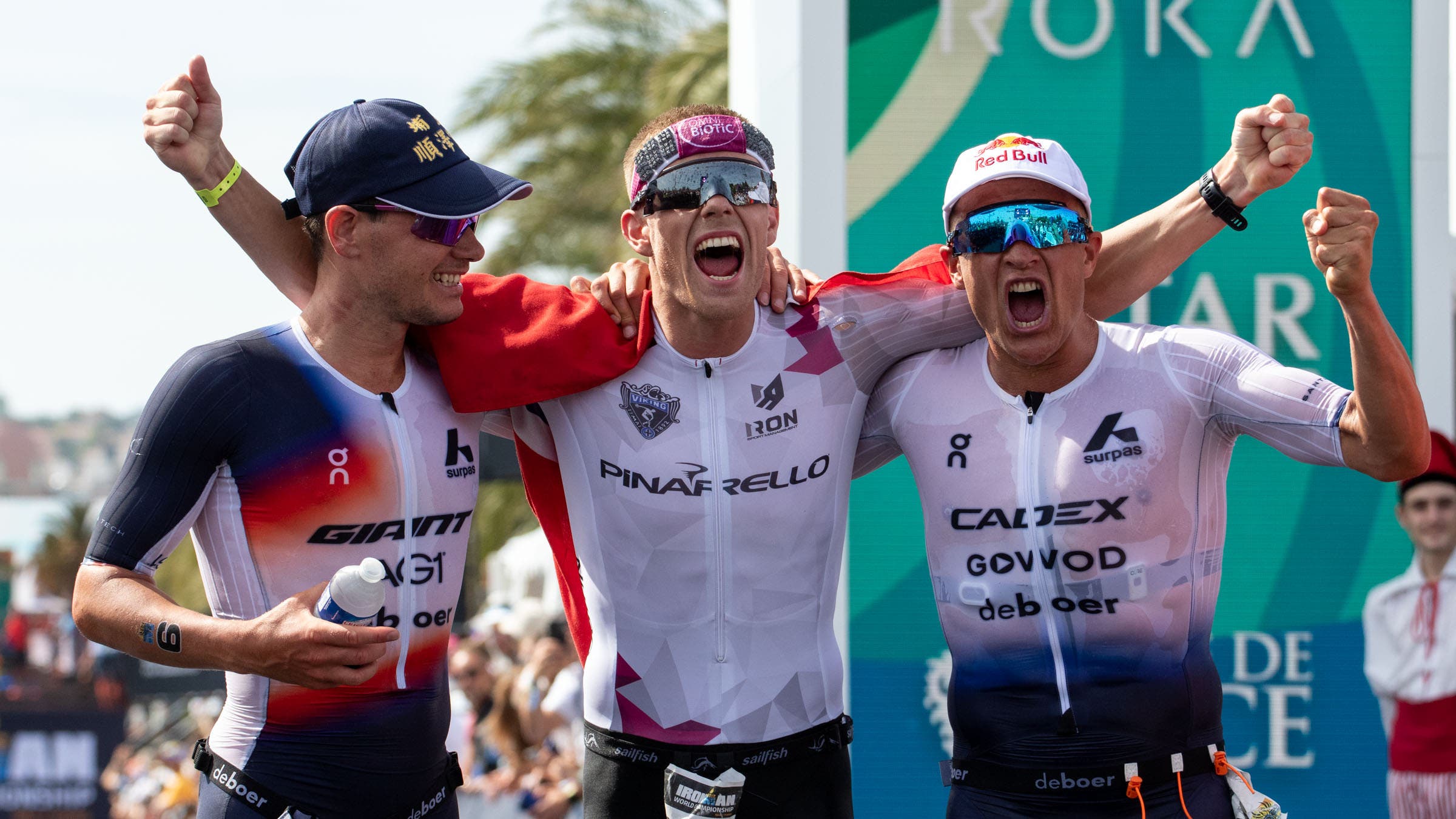 Norwegians Casper Stornes, Gustav Iden, and Kristian Blummenfelt celebrate the podium at the 2025 Ironman World Championship in Nice, France.