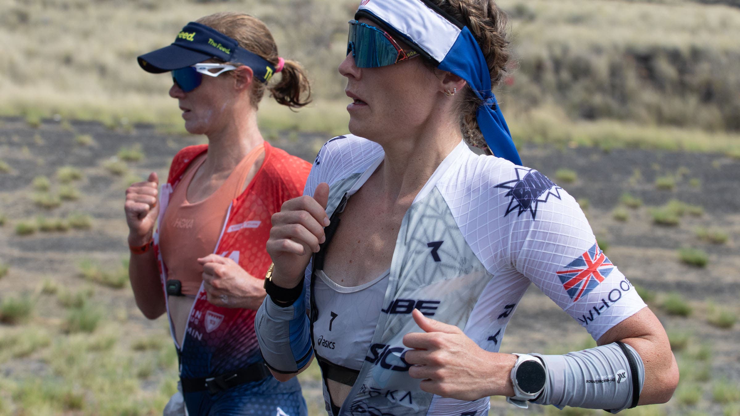 Taylor Knibb and Lucy Charles-Barclay run next to each other during the 2025 Ironman World Championship where they both DNF'd on the run course.