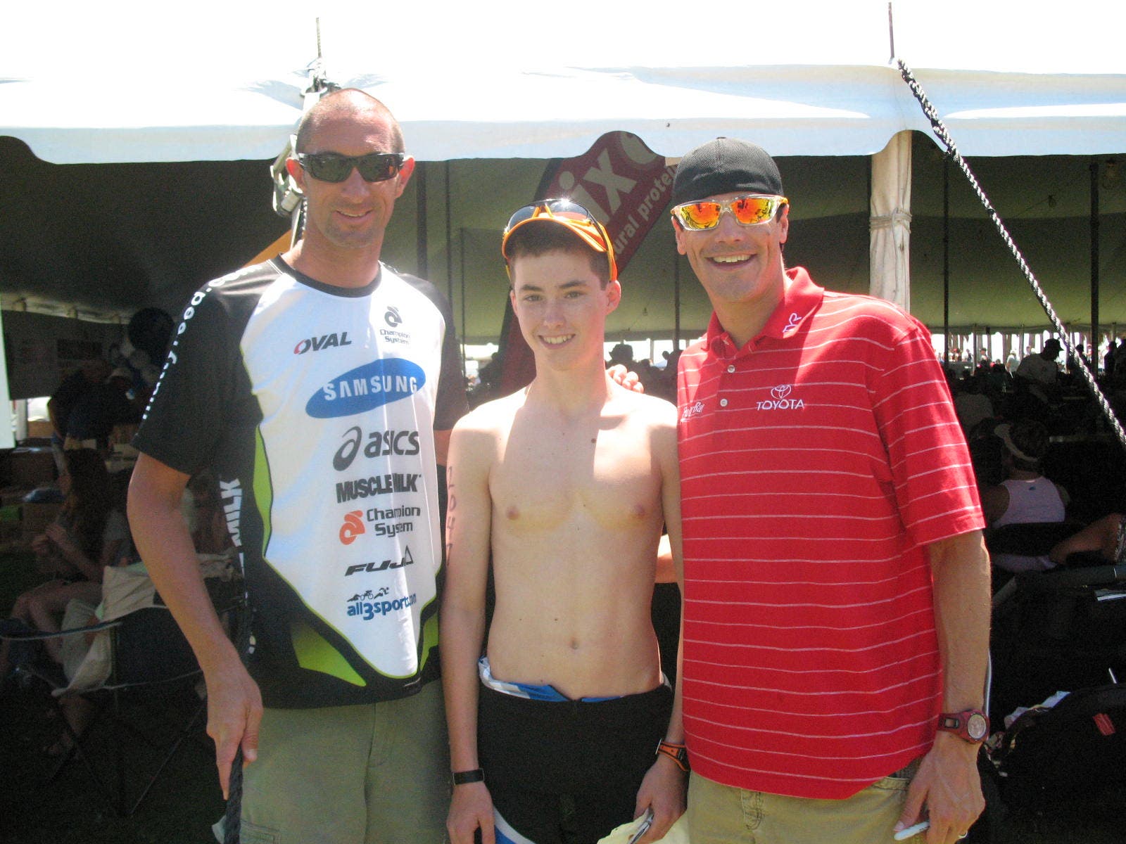 A young Robbie Deckard (center) with pro triathletes Matty Reed (L) and Andy Potts (R).