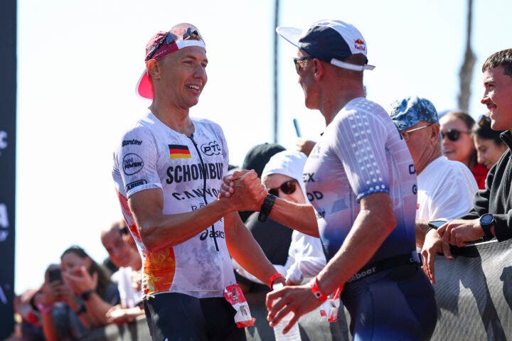 Jonas Schomburg and Christian Blumenfelt shake hands at the finish line in Oceanside