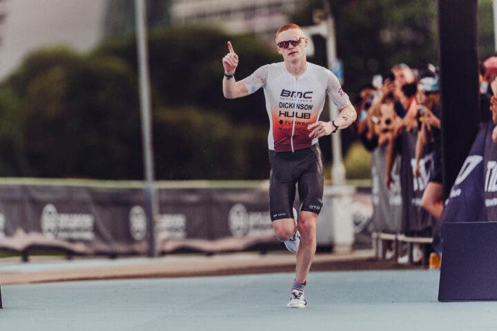 British athlete Sam Dickinson races his finger in celebration after earner second place at Singapore T100
