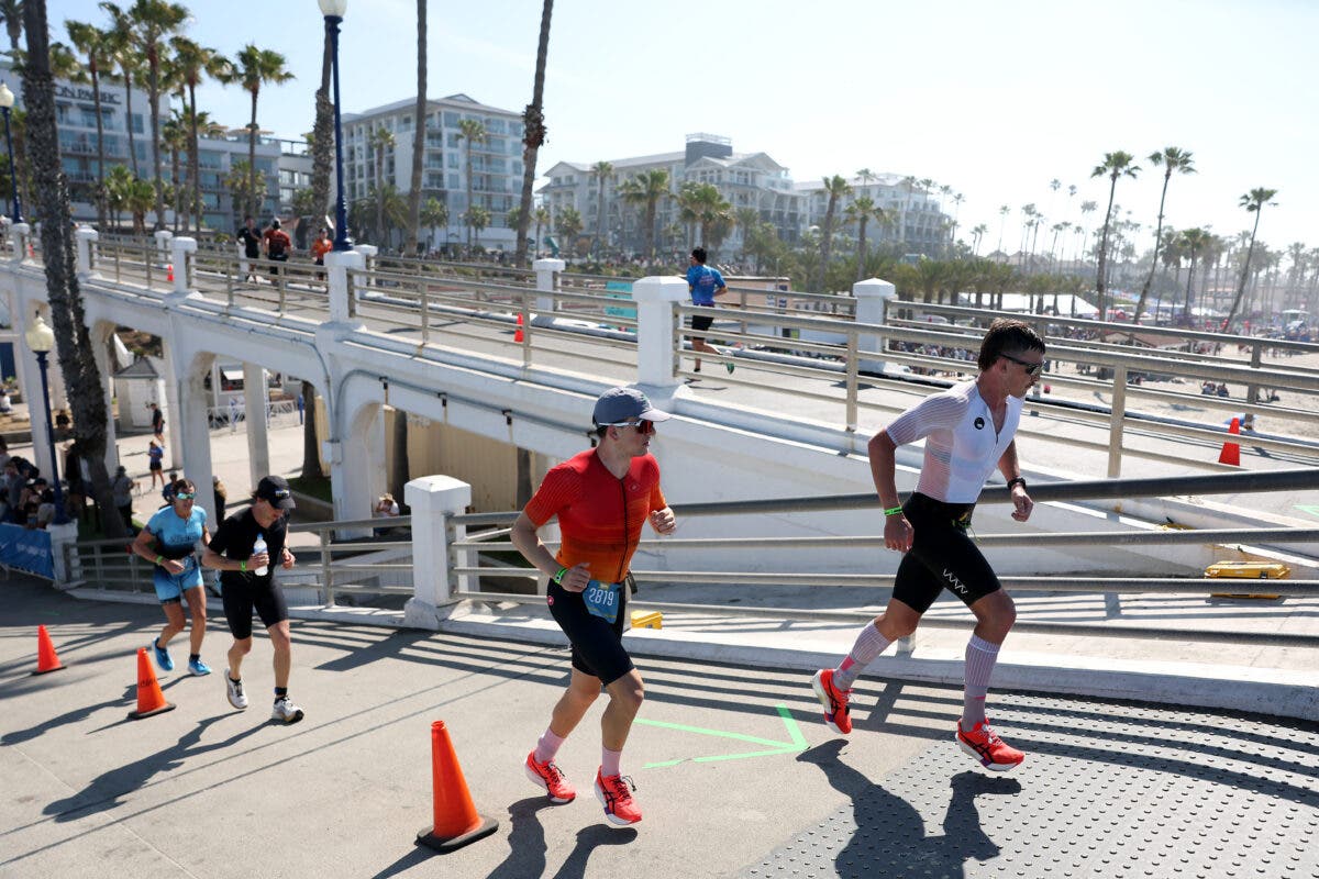 Rigid-plated shoes allow more frequent running through perception of elevated energy levels which may overload tissue faster than it recovers.