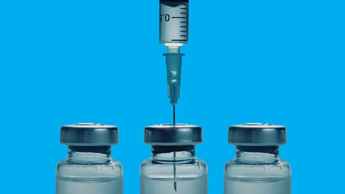 A syringe is inserted into the GLP-1 tube.