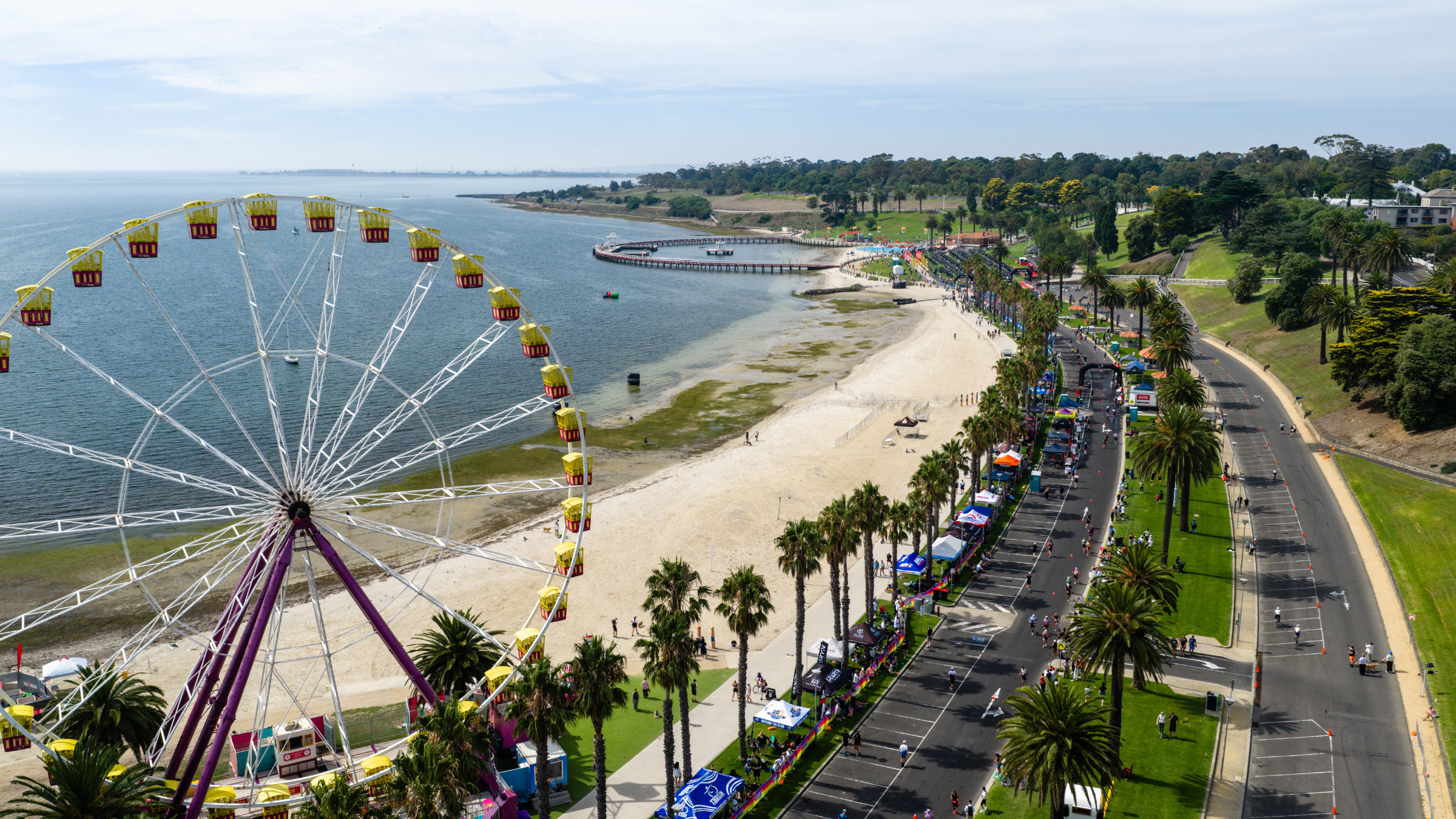 Aerial shot of the coast in Geelong, Australia as athletes race in the Ironman 70.3 Geelong race