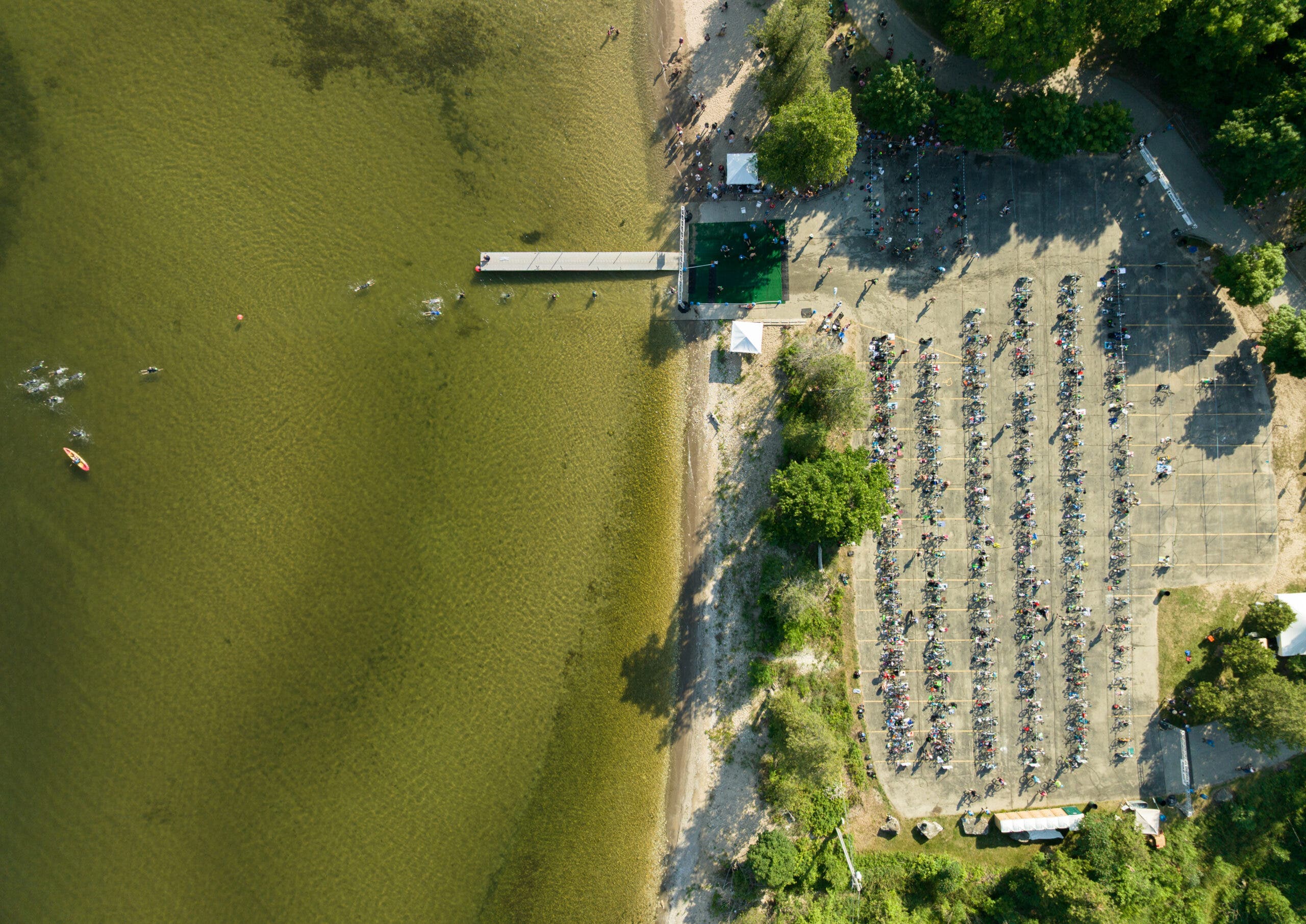 An overhead view of the Door County Triathlon Championships, which switched from a half-iron distance race to an Olympic distance in 2026 to remain competitive against giants like Ironman.