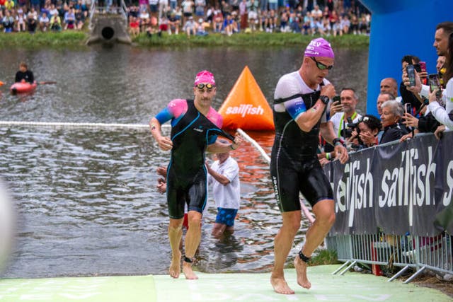 Kristian Blummenfelt exiting the swim almost three minutes back from the fron.t
