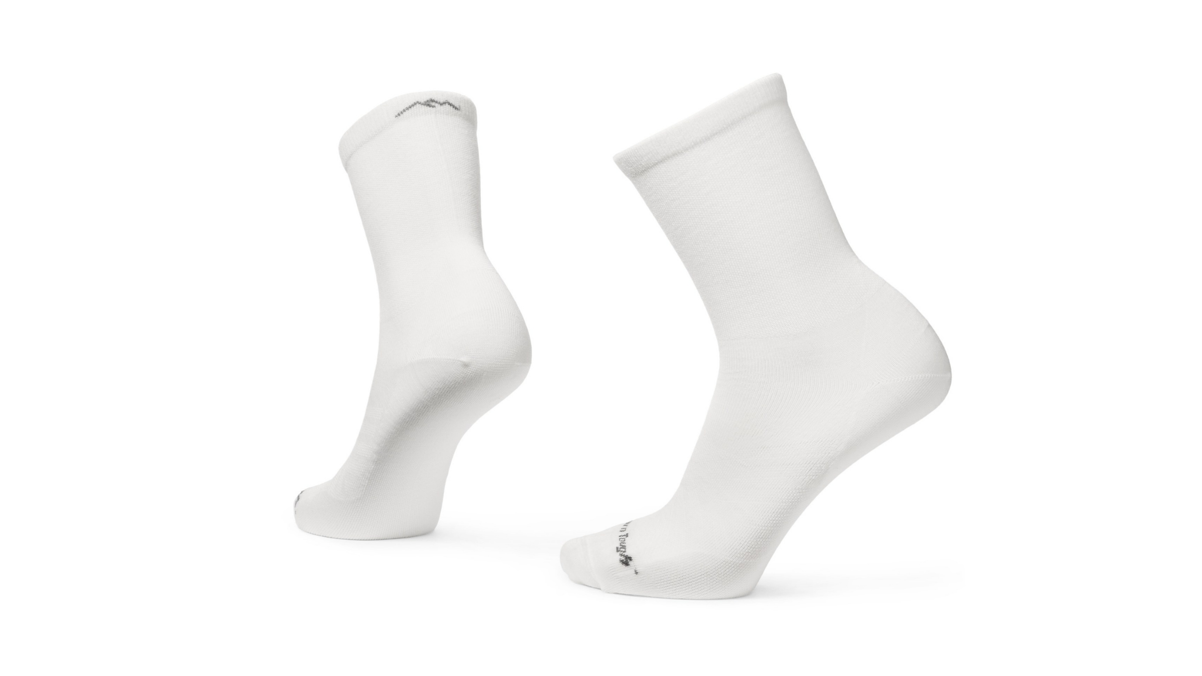 pair of white crew-length running socks from Darn Tough, on white background, on sale for Labor Day 2026