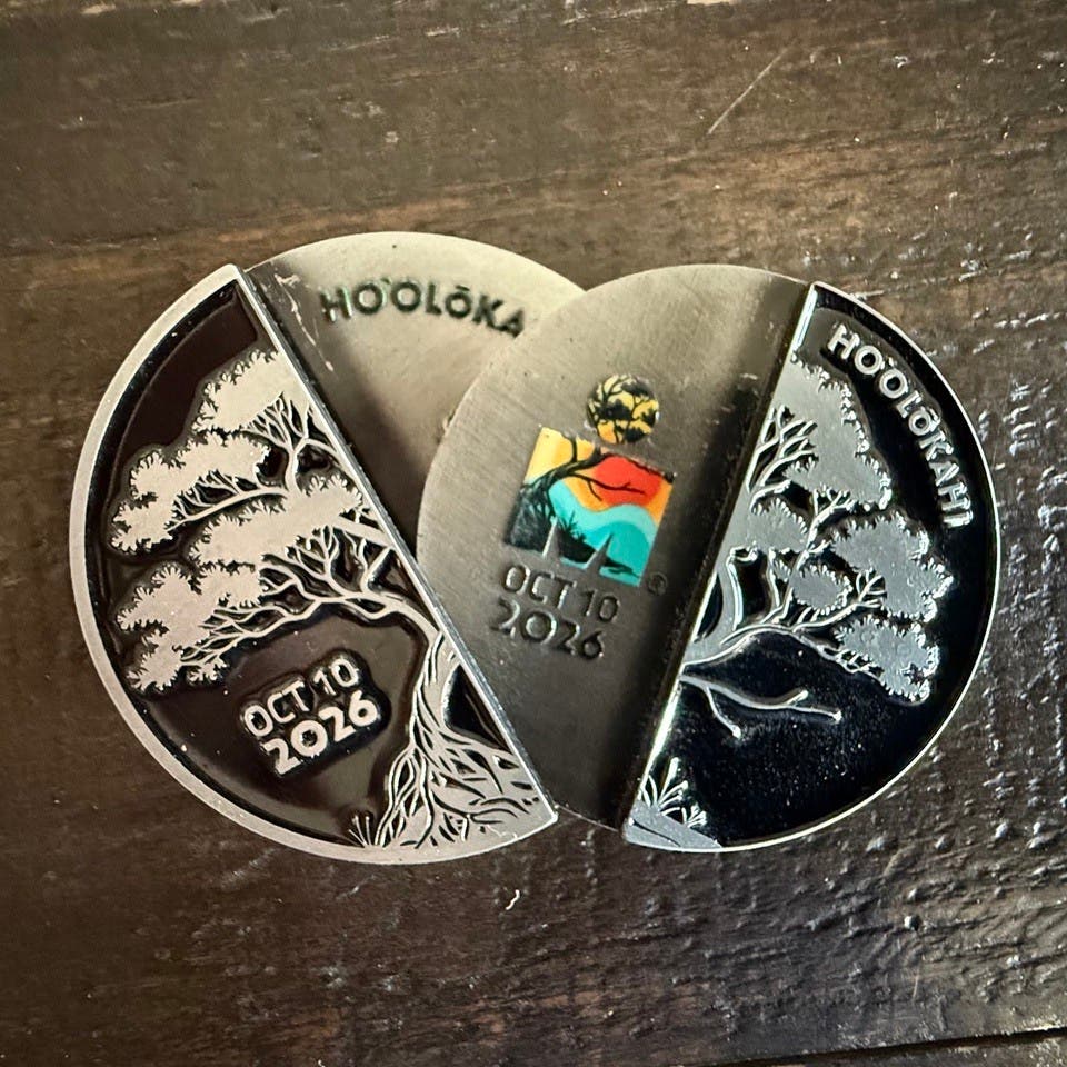 An image of qualifying coins for the 2026 Ironman World Championship.