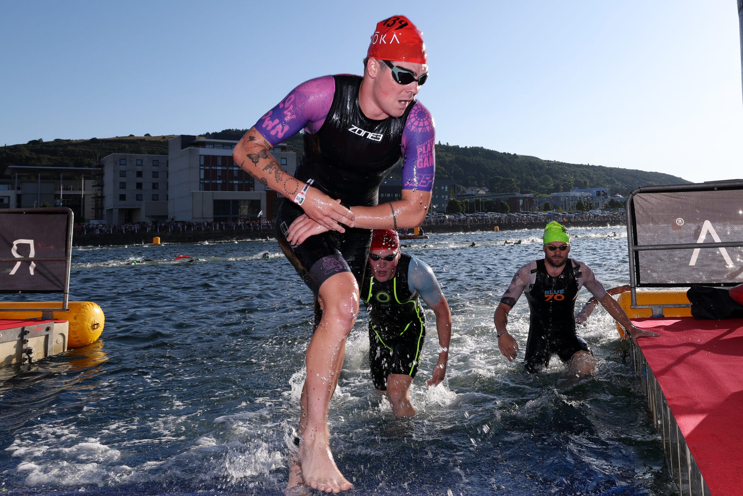Malachi Cashmore exits the swim during an Ironman race.