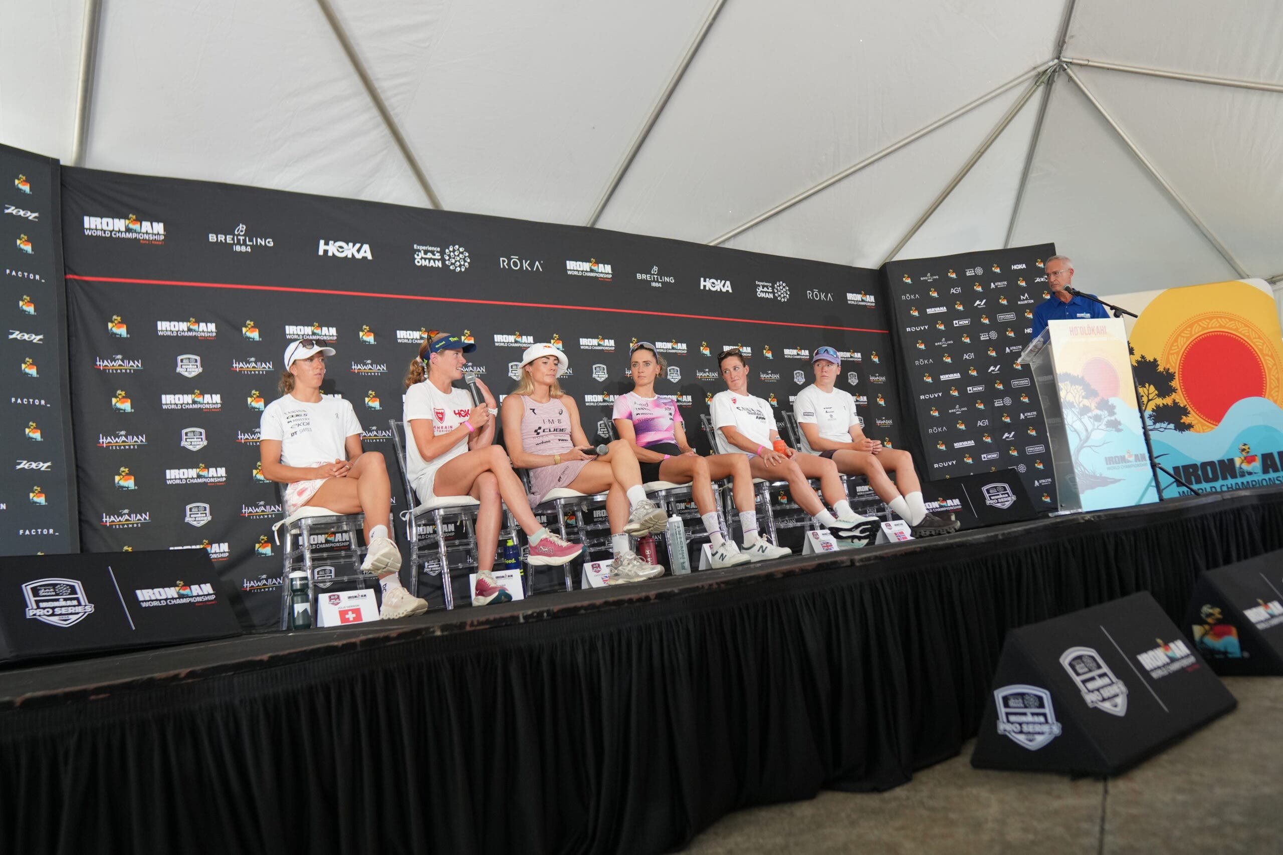 Taylor Knibb (second from left) speaks at the 2026 Ironman World Championship pro press conference.